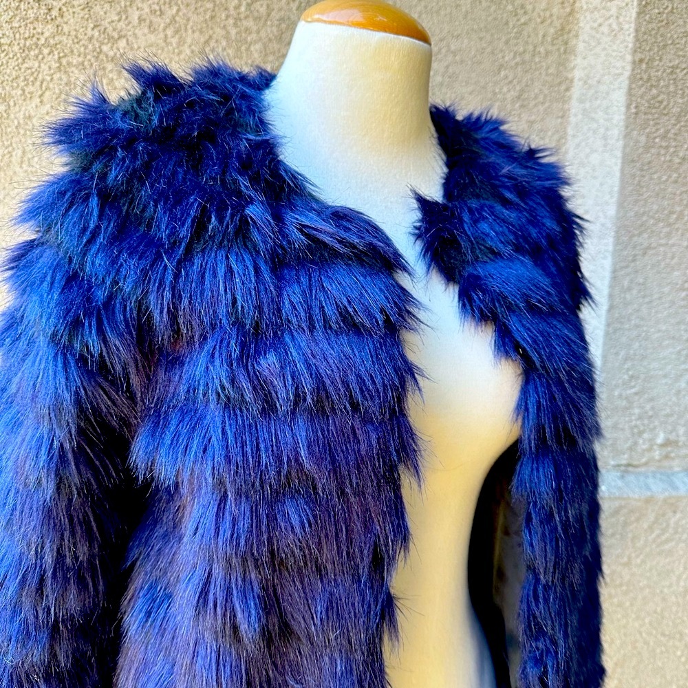 Hugo Boss Faux Fur coat. New. Never been worn. Christmas Wear